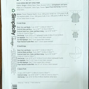 May include: Simplicity pattern S9432 for a plush Grogu and Space Pram. Includes fabric requirements for Minky Fleece, Fleece, and Cotton. Features diagrams for a large Grogu, small Grogu, and Space Pram.