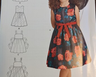 Uncut Simplicity Sewing Pattern D0709 for Girls/Childs Dress With 4 Variations Sizes 3-8