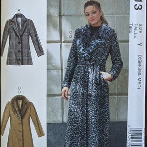 May include: A sewing pattern for a coat with a leopard print design. The pattern includes three different styles: a plaid coat, a brown coat with a fur collar, and a leopard print coat with a fur collar. The pattern is for sizes X-Small, Small, Medium, and Large.
