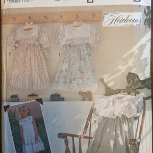 Uncut Retro Simplicity Sewing Pattern #7193 for Girls&#39; Dresses in 4 Variations Sizes 3 - 8