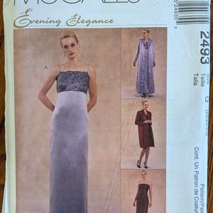 May include: A McCall's Evening Elegance sewing pattern envelope 2493 for a dress and coat. The front shows a long lavender dress with a dark bodice and three smaller images of the garments in lavender and brown, including a long coat and dress.