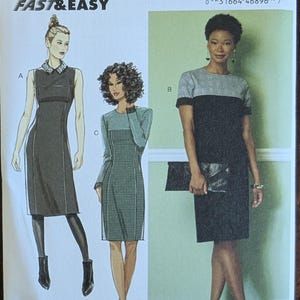 May include: A sewing pattern package with the text "B6410 Butterick FAST & EASY". The package features illustrations of three different dresses. The package is designed and printed in the USA.