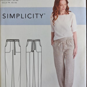 Uncut Simplicity Sewing Pattern #S9050 for Misses&#39; Plus Size Pull-On Pants with Front and Back Patch Pockets. Sizes 14-22.