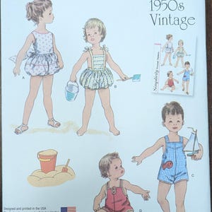 May include: Vintage Simplicity sewing pattern featuring illustrations of children's swimwear from the 1950s. The pattern includes various styles of swimsuits and beachwear, with the text "1950s Vintage" displayed prominently.