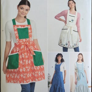 Uncut Simplicity Sewing Pattern #S9435 for Misses and Misses&#39; Plus Size Aprons. Sizes XS-XL.