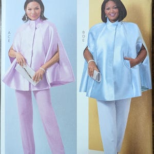 May include: Butterick sewing pattern B6978 featuring two women modeling a cape and pants ensemble. The pattern includes sizes AA (10-12-14-16-18). The cape is shown in light pink and light blue, paired with matching pants.