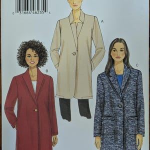 May include: A Very Easy Vogue sewing pattern envelope V9133 for sizes Xsm-Sml-Med. The front displays three illustrations of long-sleeved coats: a beige coat with a stand collar, a red coat with a notched lapel, and a blue textured coat with patch pockets.