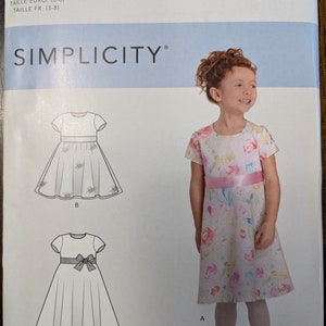 Uncut Simplicity Sewing Pattern #R10510 for Girl&#39;s Dresses with Length and Skirt Variations. Sizes 3-8.