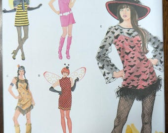 Uncut Simplicity Sewing Pattern 2324 for Misses and Misses Plus Size Costumes. Ladybug, Bee, Indian, Witch Costumes. Sizes XS-XL.