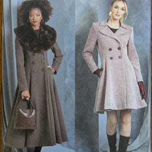 May include: Vogue Patterns V1971 sewing pattern envelope featuring two coat variations. The left shows a long, dark brown, double-breasted coat with a faux fur collar. The right shows a shorter, light mauve, double-breasted coat with a notched collar.