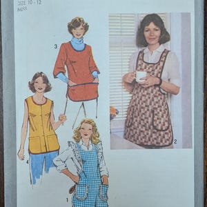 May include: Simplicity pattern 9209 featuring illustrations of aprons and a vest. The aprons include a blue and white checkered design with pockets and a brown and white checkered apron. The vest is yellow. The pattern is for sizes 10-12.