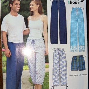May include: A sewing pattern for pants and shorts. The pattern includes instructions for making a pair of blue pants, a pair of blue and white floral pants, a pair of blue and white floral shorts, and a pair of blue and green plaid shorts. The pattern is from New Look and is labeled "Easy 1 Hour".
