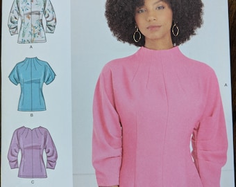 Uncut Simplicity Sewing Pattern #S9705 for Misses&#39; Plus Size Tops with Sleeve and Neckline Variations. Sizes 16-24.