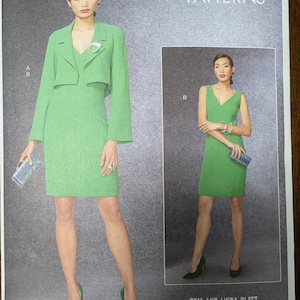 May include: Vogue Patterns sewing pattern for a green dress and matching jacket. The pattern number is V1536 and the size is A5 (6-8-10-12-14). The pattern is designed by Tom and Linda Platt.