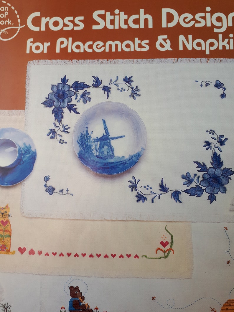 Cross stitch patterns for placemats /& napkins from American School of Needlework