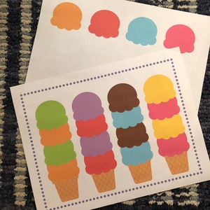 May include: Four ice cream cones with different colored scoops of ice cream. The cones are on a white background with a purple dotted border. The ice cream scoops are green, purple, brown, and pink.