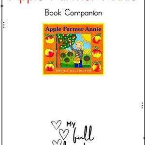 May include: A digital document titled Apple Farmer Annie Book Companion featuring a central illustration of a person picking apples in an orchard, surrounded by red apples. The bottom includes the text My full heart Shop with three hearts.