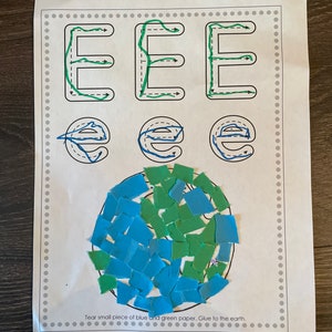 May include: A printable worksheet with instructions to tear small pieces of blue and green paper and glue them to the earth. The worksheet also includes practice tracing the letter 'E' in uppercase and lowercase.