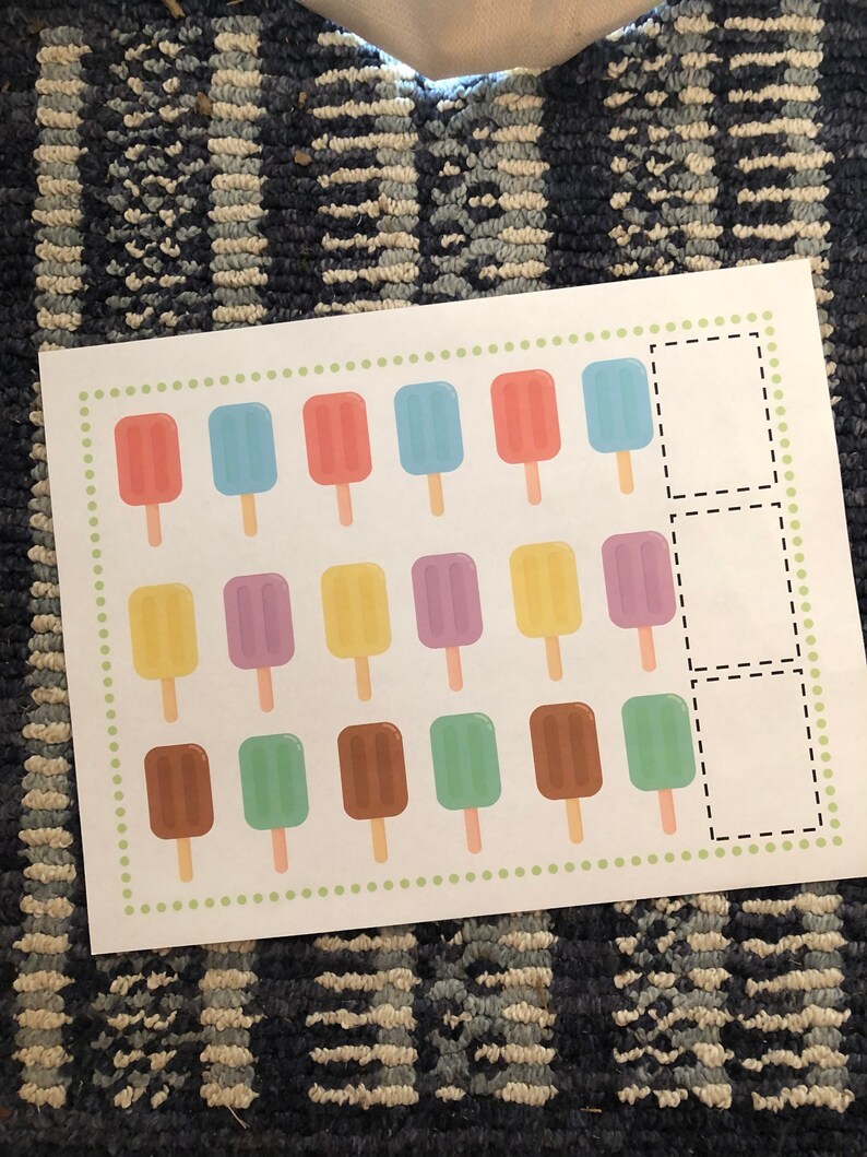 May include: A printable worksheet with a grid of 18 popsicle images in various colors. The popsicles are arranged in three rows of six. There are three blank boxes at the right side of the grid.