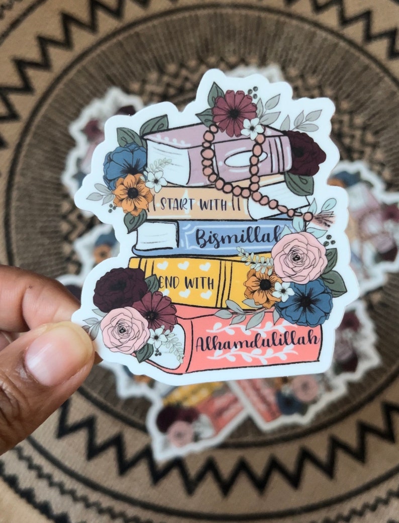 May include: A sticker with a stack of books decorated with flowers and a string of beads. The books have the words "Start with Bismillah" and "End with Alhamdulillah" on them.