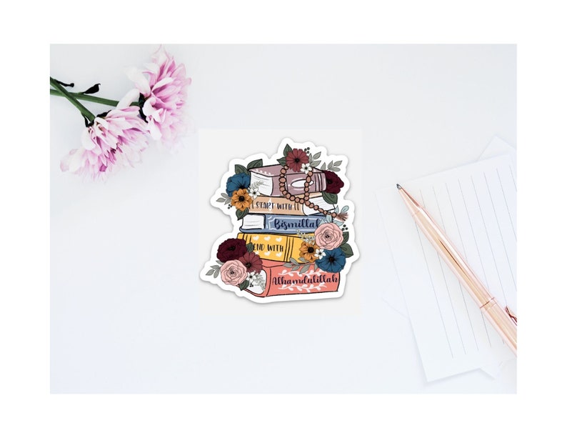 May include: A sticker featuring a stack of colorful books with floral accents. The books have the text "Start with it Bismillah" and "Alhamdulillah" on them.