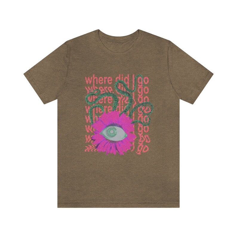 May include: A brown t-shirt featuring a pink flower with a green eye in the centre. The text "where did I go" is repeated in pink around the flower.