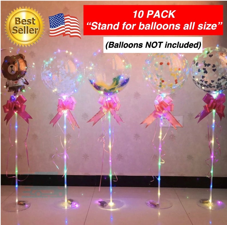 Pode incluir: Um conjunto de 10 suportes para bal&otilde;es transparentes com luzes LED. Cada suporte tem uma fita rosa e uma base de pl&aacute;stico transparente. Os suportes s&atilde;o projetados para segurar bal&otilde;es de v&aacute;rios tamanhos. "10 PACK "Stand for balloons all size" (Balloons NOT included)"