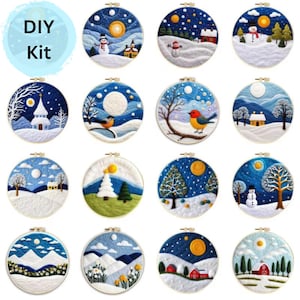 Op de afbeelding: Een verzameling doe-het-zelf borduurpakketten met winterlandschappen. Elke kit bevat een ronde borduurring en een gedetailleerd geborduurd ontwerp van besneeuwde landschappen, sneeuwpoppen en huizen. De tekst "DIY Kit" is zichtbaar linksboven.