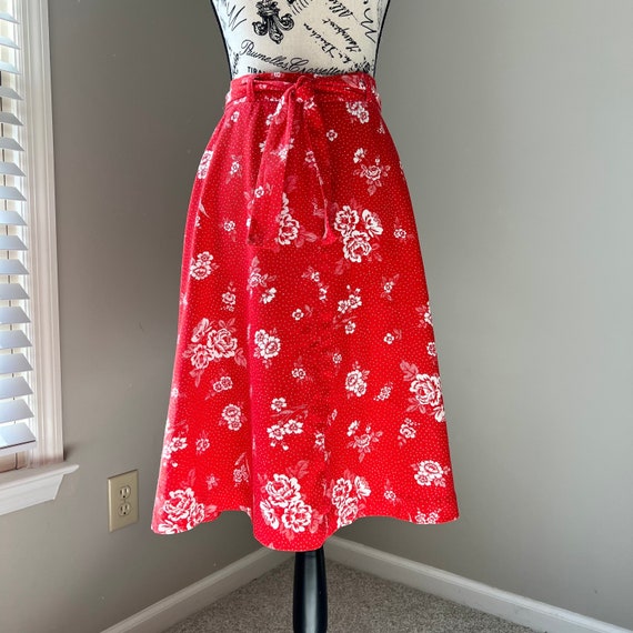 1970s red skirt with white flowers and waist sash… - image 1