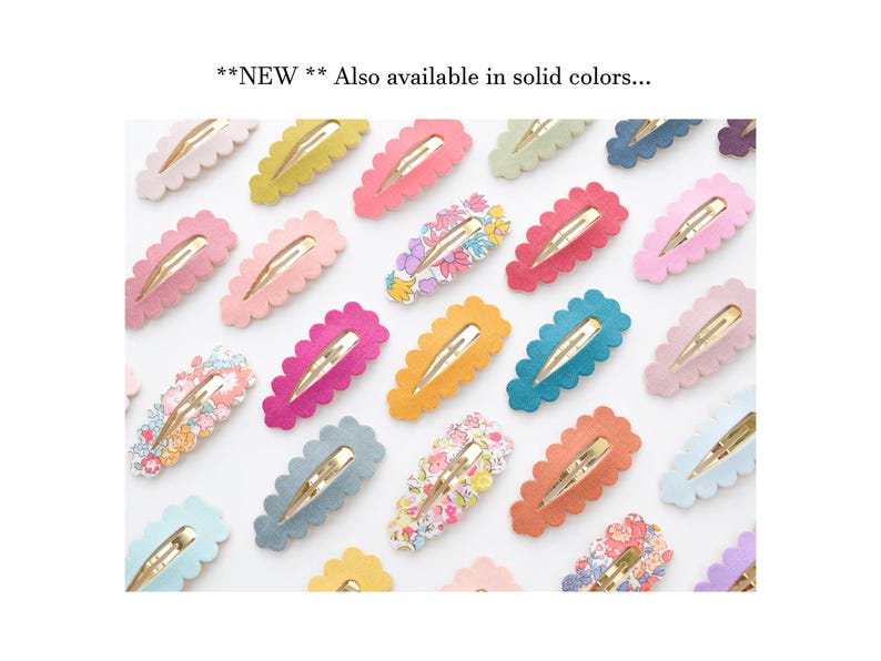 May include: Assortment of colorful hair clips with scalloped edges. Some clips feature floral patterns, while others are solid colors. **NEW** Also available in solid colors.