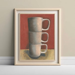 May include: A framed painting of four white ceramic mugs stacked on top of each other against a red background.
