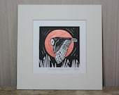 Owl and moon, original, hand coloured, mounted lino print