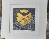 October moon - original, hand painted, mounted linocut print of moonlit bats, a pumpkin and spider