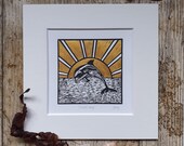 Sunset leap - original, hand painted, mounted linocut print of a dolphin at sunset