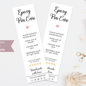 May include: Two white bookmark-style cards with black text that reads "Epoxy Pen Care". The cards have a pink heart and list care instructions for epoxy pens. The text includes "Avoid extreme temperatures", "Keep out of mouth", "Handle with care", and "Refillable with 0.7 gel refills". The cards also have a five-star rating and the text "Handmade with love" and a website address.