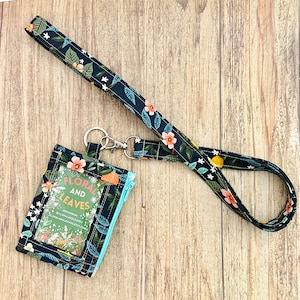 Cartera con cremallera para identificación y cordón con estampado de cítricos en azul marino Rifle Paper (1/2 pulgada)