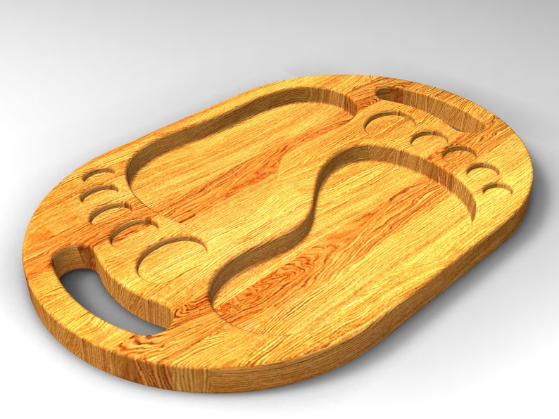 May include: A wooden serving tray shaped like a foot with a cutout design. The tray has a handle and is made of light brown wood.