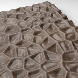 May include: A close-up of a brown wood panel with a textured, geometric pattern. The pattern is made up of raised, hexagonal shapes that create a three-dimensional effect.