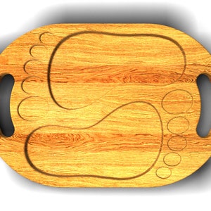 May include: A wooden cutting board with two foot-shaped impressions. The board has two handles on the sides.