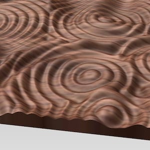 May include: A close-up of a wooden surface with a carved pattern of concentric circles. The wood has a rich brown colour and a natural grain.