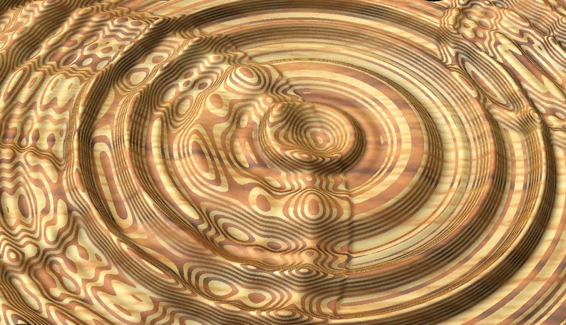 Puede incluir: Patr&oacute;n abstracto de c&iacute;rculos conc&eacute;ntricos en tonos marrones y dorados, que se asemeja a la veta de la madera.