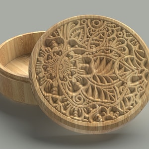 May include: A wooden box with a carved floral design on the lid. The box is open and the inside is visible.