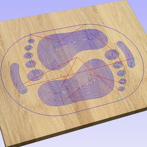 May include: A close-up of a wooden surface with a blue and red design. The design is a series of concentric circles and lines that create a pattern resembling a footprint.