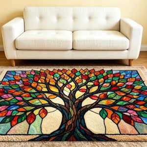 May include: A rectangular area rug featuring a vibrant, multi-colored tree design with a stained-glass aesthetic. The tree has a dark brown trunk and branches filled with numerous leaves in shades of red, orange, yellow, green, and blue.