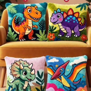 May include: Four square throw pillows with colorful dinosaur designs. Each pillow features a different dinosaur illustration: a T-Rex, a Stegosaurus, a Triceratops, and a Pterodactyl. The pillows are on a yellow sofa.