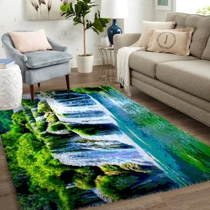 May include: A green, blue, and white area rug with a waterfall design. The rug has a fuzzy texture and is perfect for adding a touch of nature to your home.