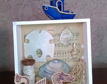 Diorama di conchiglie: Mostri marini e arte delle vacanze in rimorchiatore