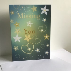 Tarjeta de felicitación Extrañándote