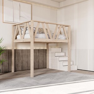 May include: A wooden loft bed with a white bedspread and a set of white stairs. The bed is in a room with white walls and a wooden floor.
