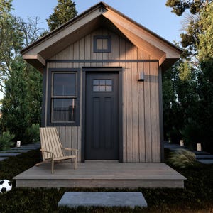 May include: A small wooden cabin with a black door and windows. The cabin has a wooden porch with a wooden chair and a soccer ball on the ground in front of it.